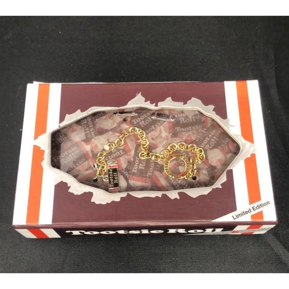 NEW IN BOX Tootsie roll earrings and charm bracelet